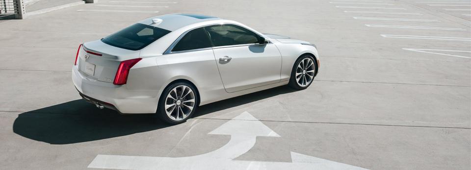 2015-ats-coupe-photos-exterior-white-arrow-960x400-5399e45122389ed91541ace4ef758875.jpg