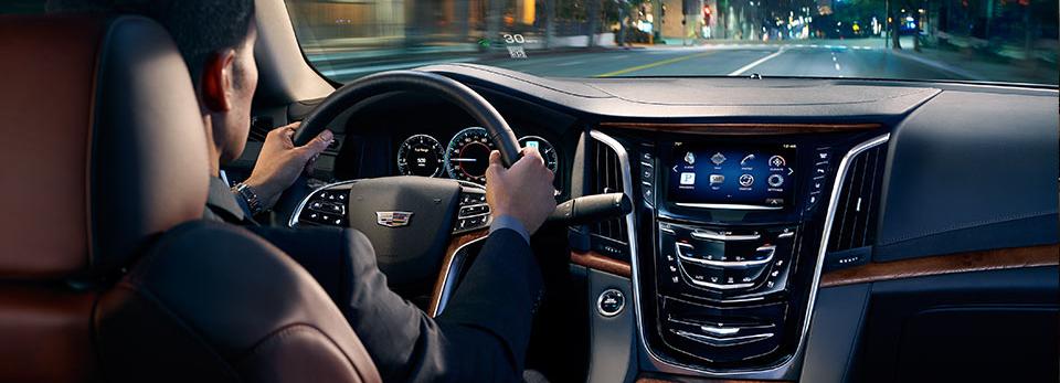 2015-escalade-i-photo-gallery-interior-driving-960x400-bf0bd256da6fa3aacc76d14b6ee07b94.jpg
