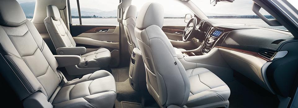 2015-escalade-i-photo-gallery-interior-secondrow-960x400-ebd42d22195c14056819893bbbe84aee.jpg